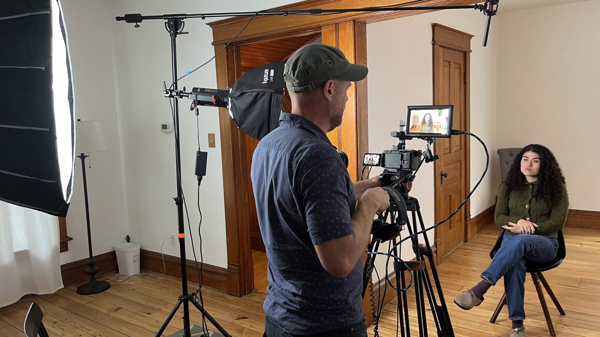 film director interviewing woman on camera