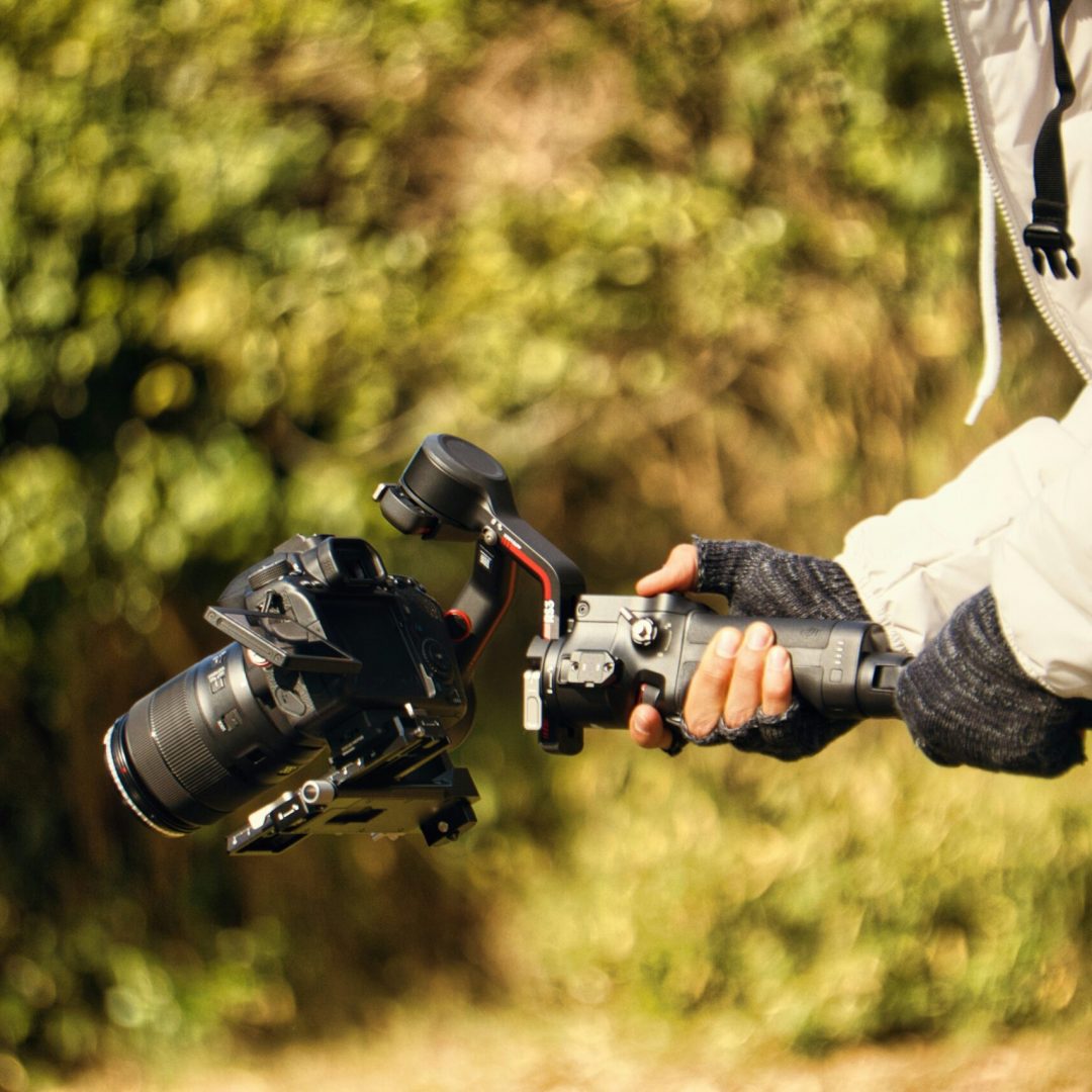 video production staff using a camera on a gimbal